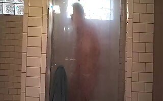 Old *** sitter viigorously rubbing clit with an increment of asshole in shower